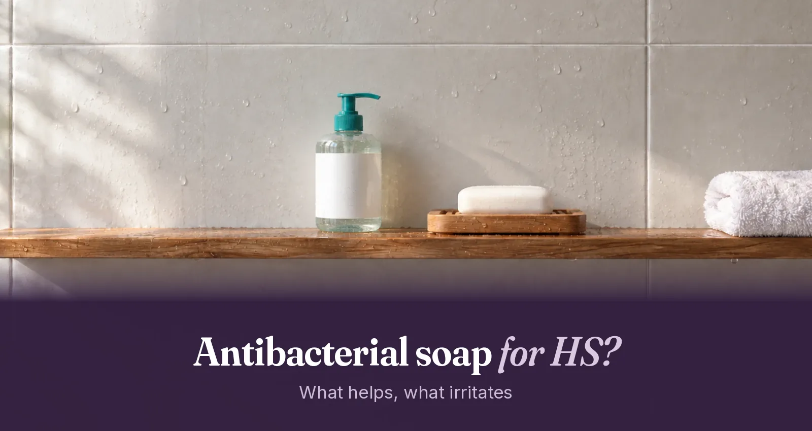 Antiseptic wash bottle with a teal pump and a zinc soap bar on a wet wooden shower shelf